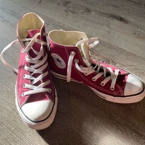 Burgundy colored Converse high-tops